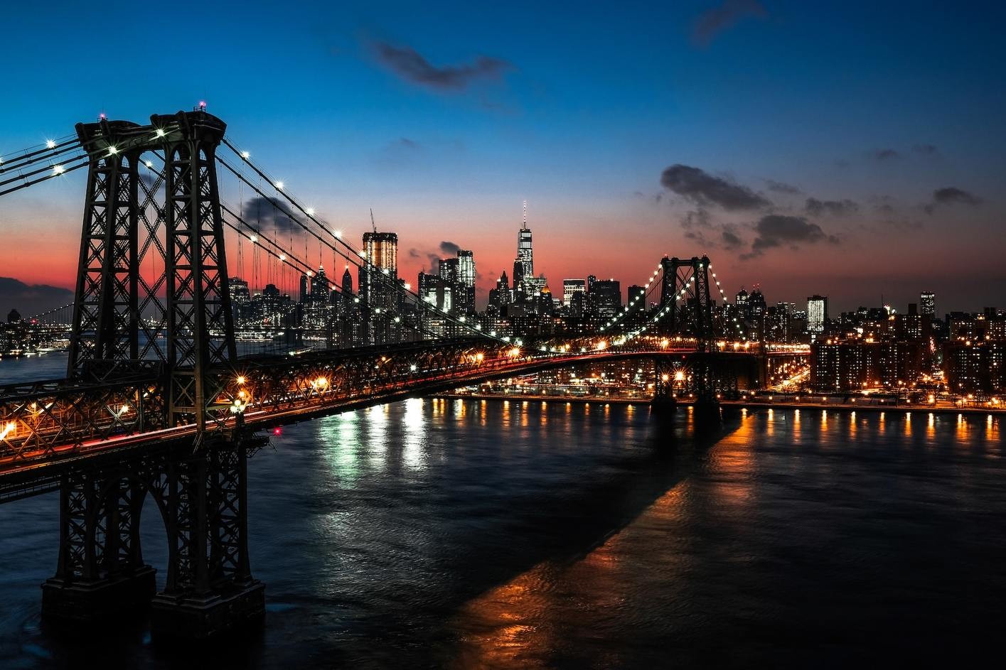 Vistas de la ciudad iluminada con panoramica puente Broklin